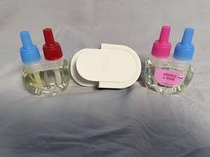 Febreze Plug In Warmer 2 Scented Oil Refills: Romance & Desire and Unstopables